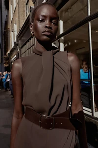SLEEVELESS BELTED JUMPSUIT
