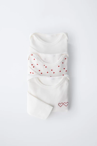 THREE-PACK OF HEART BODYSUITS