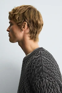 GARMENT-DYED CABLE KNIT SWEATER