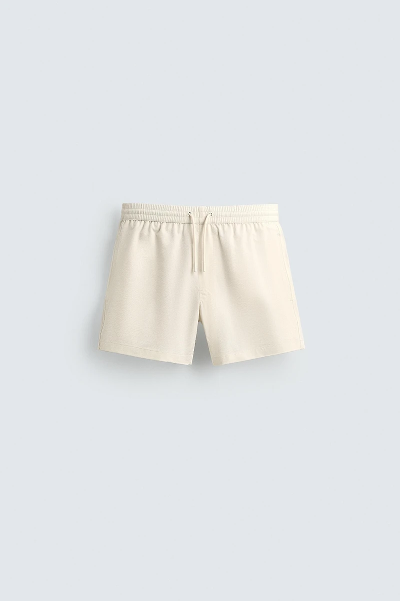 SEERSUCKER SWIM TRUNKS