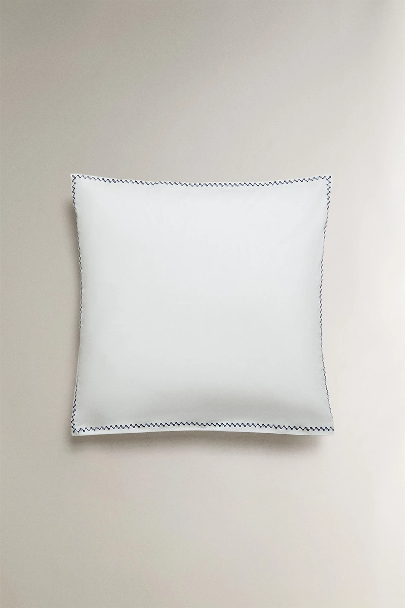 TAIE D’OREILLER BRODERIE BORDURE
