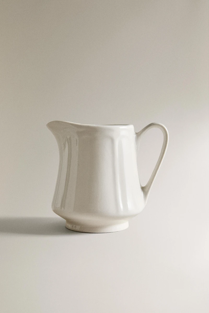 PORCELAIN CREAM PITCHER WITH RAISED PATTERN