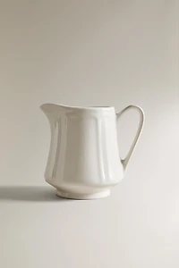 PORCELAIN CREAM PITCHER WITH RAISED PATTERN