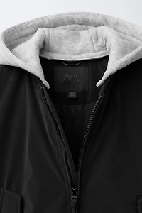 RUBBERIZED BOMBER JACKET WITH REMOVABLE FLEECE HOODIE