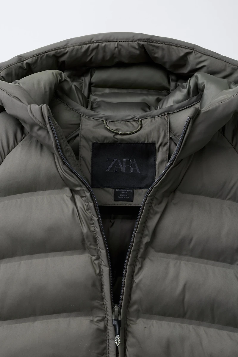 VESTE ULTRALÉGÈRE À CAPUCHE DÉPERLANTE