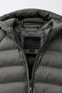 VESTE ULTRALÉGÈRE À CAPUCHE DÉPERLANTE