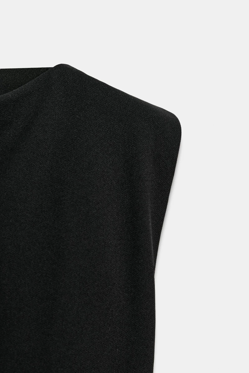 CREPE PEPLUM SHOULDER PAD TOP