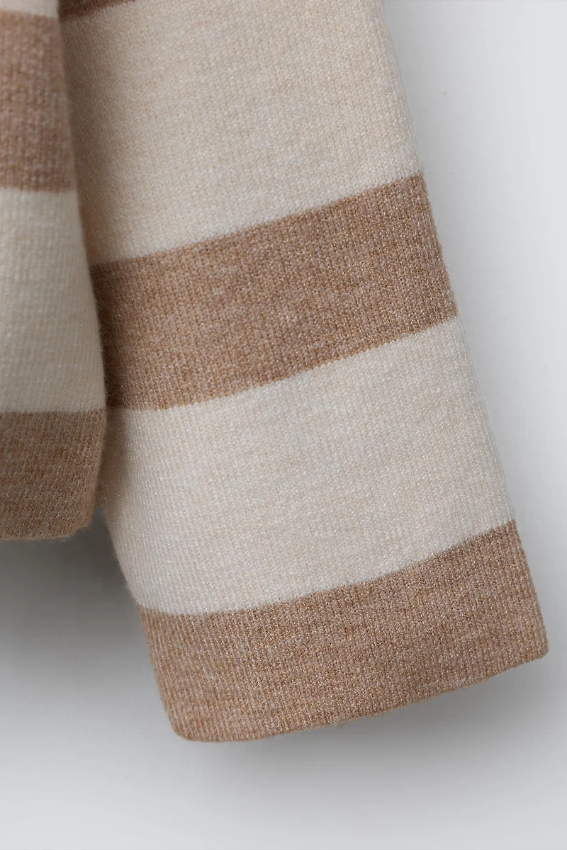 POLO EN MAILLE À RAYURES AVEC POCHE CŒUR