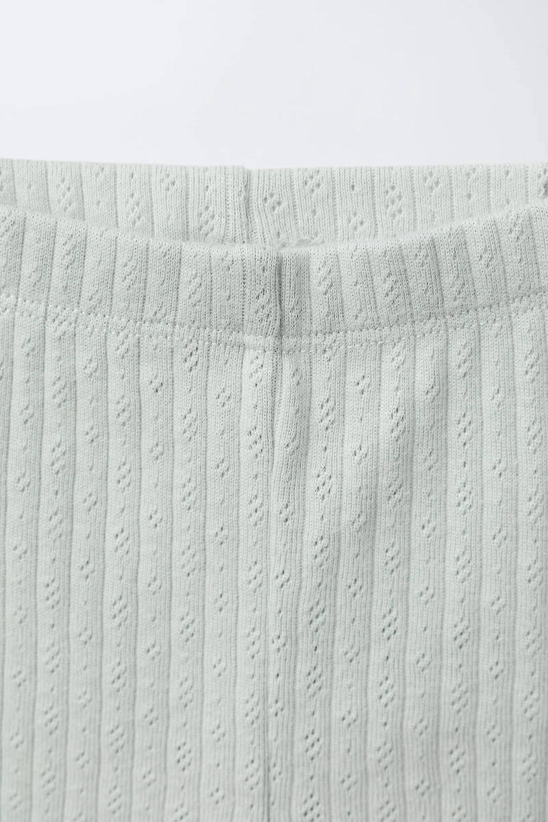 ENSEMBLE BODY CROISÉ ET LEGGING POINTELLE SURPIQÛRES
