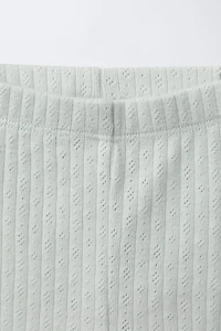 ENSEMBLE BODY CROISÉ ET LEGGING POINTELLE SURPIQÛRES
