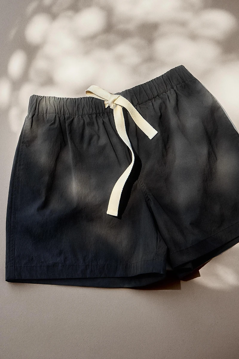 SOLID MID-LENGTH SWIM SHORTS