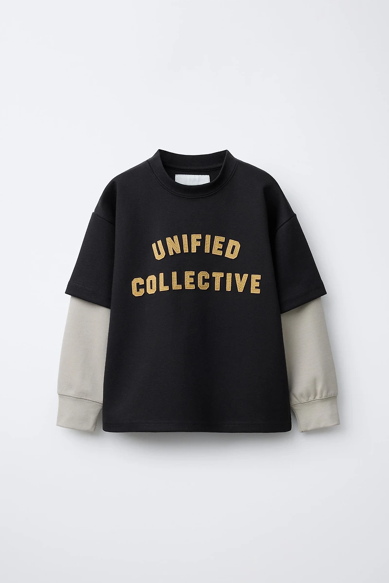 VARSITY INTERLOCK DOUBLE SLEEVE SWEATSHIRT