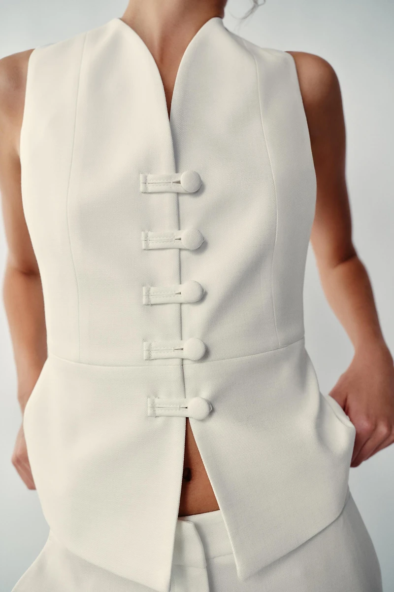 GILET PEPLUM
