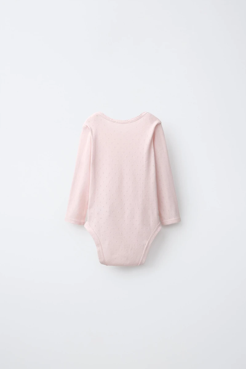 FIVE-PACK FLORAL BODYSUITS