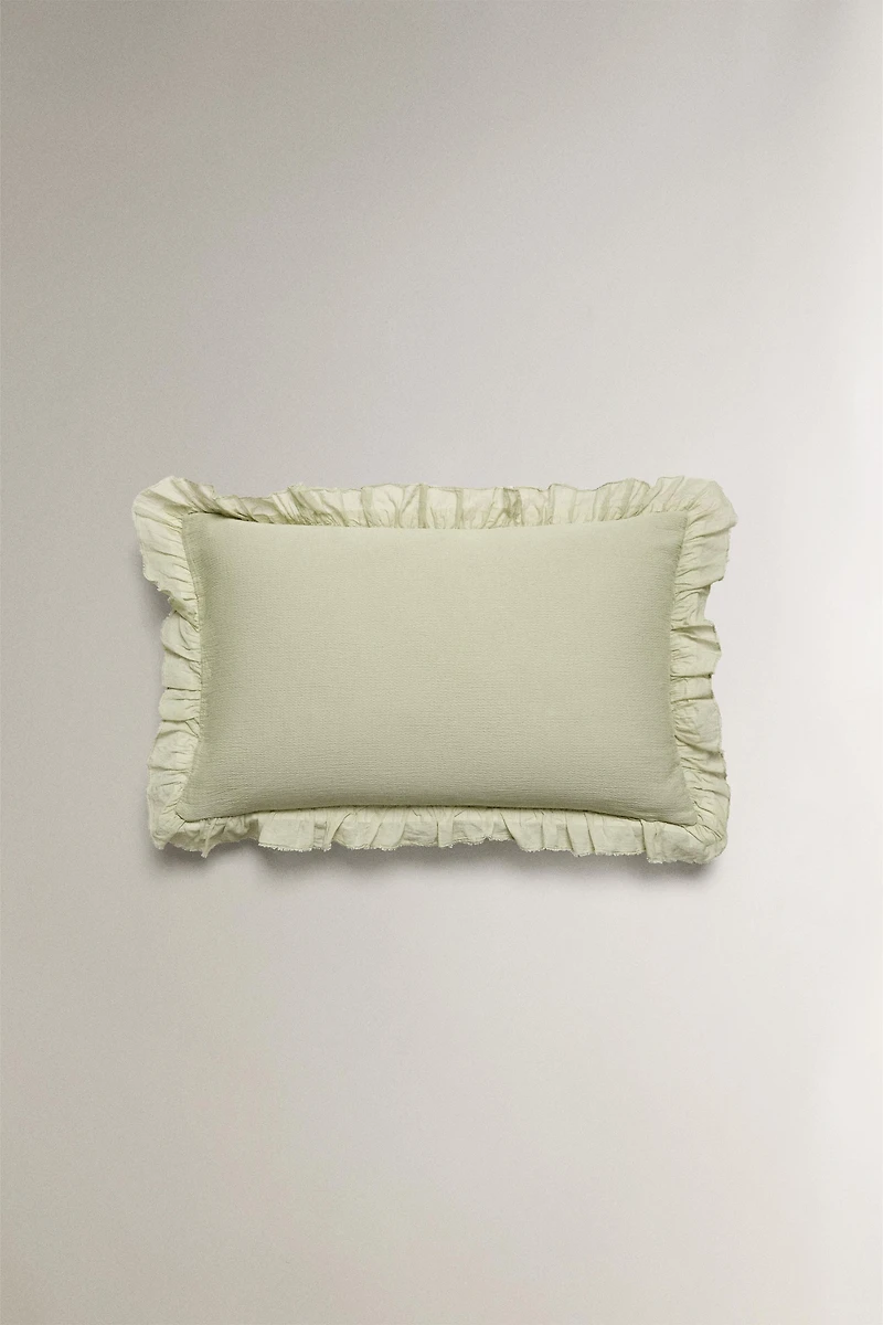 TEXTURED THROW PILLOW COVER WITH RUFFLE TRIM