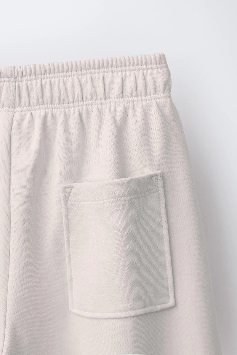 PANTALON À JAMBES LARGES INTERLOCK