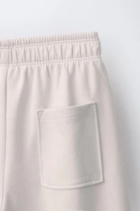 PANTALON À JAMBES LARGES INTERLOCK