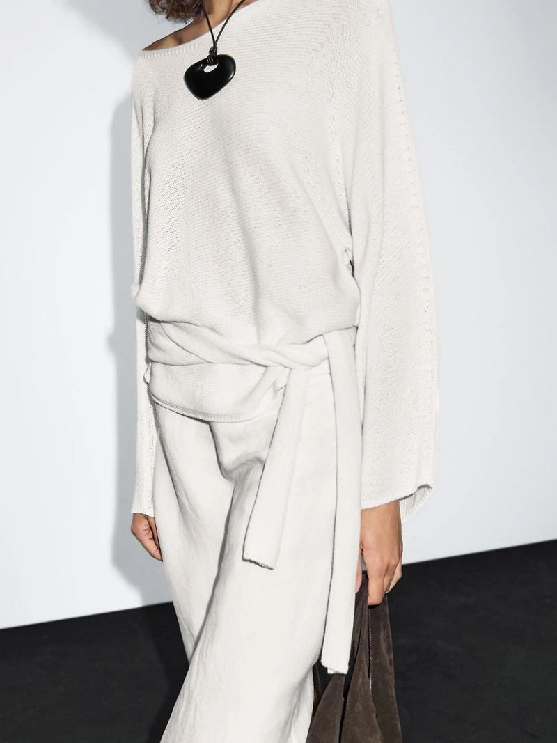 Knit sweater with bow detail
