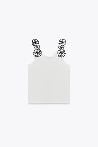 TOP AVEC APPLIQUES FLEURS