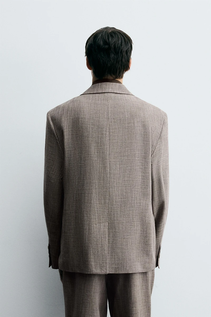 TEXTURED SUIT JACKET