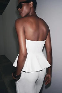 INTERLOCK PEPLUM TOP