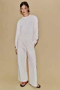 PANTALON LARGE EFFET DÉLAVÉ