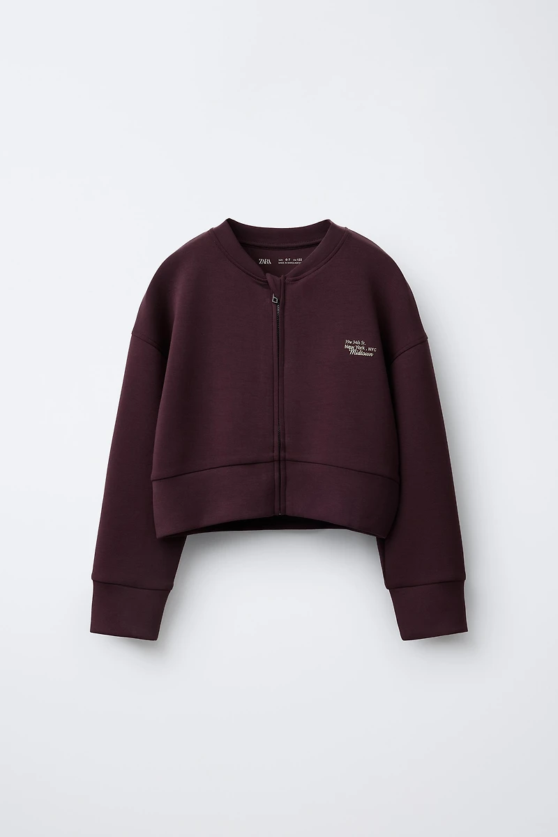 BOMBER JACKET WITH MODAL EMBOSSED TEXT