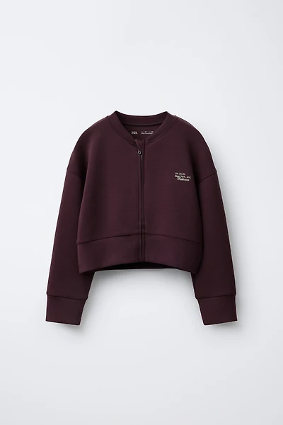 BOMBER JACKET WITH MODAL EMBOSSED TEXT