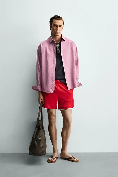 SHORTS WITH CONTRAST PIPING