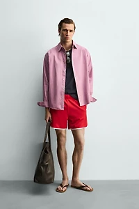 SHORTS WITH CONTRAST PIPING