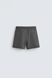 METALLIC EYELET SWIMSUIT