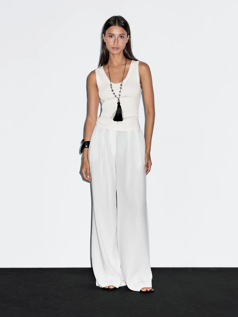 Top avec liseré effiloché en coton mélangé