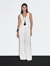 Top avec liseré effiloché en coton mélangé