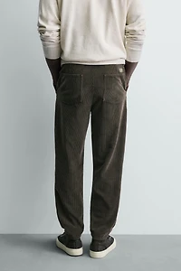 TAPERED FIT CORDUROY PANTS