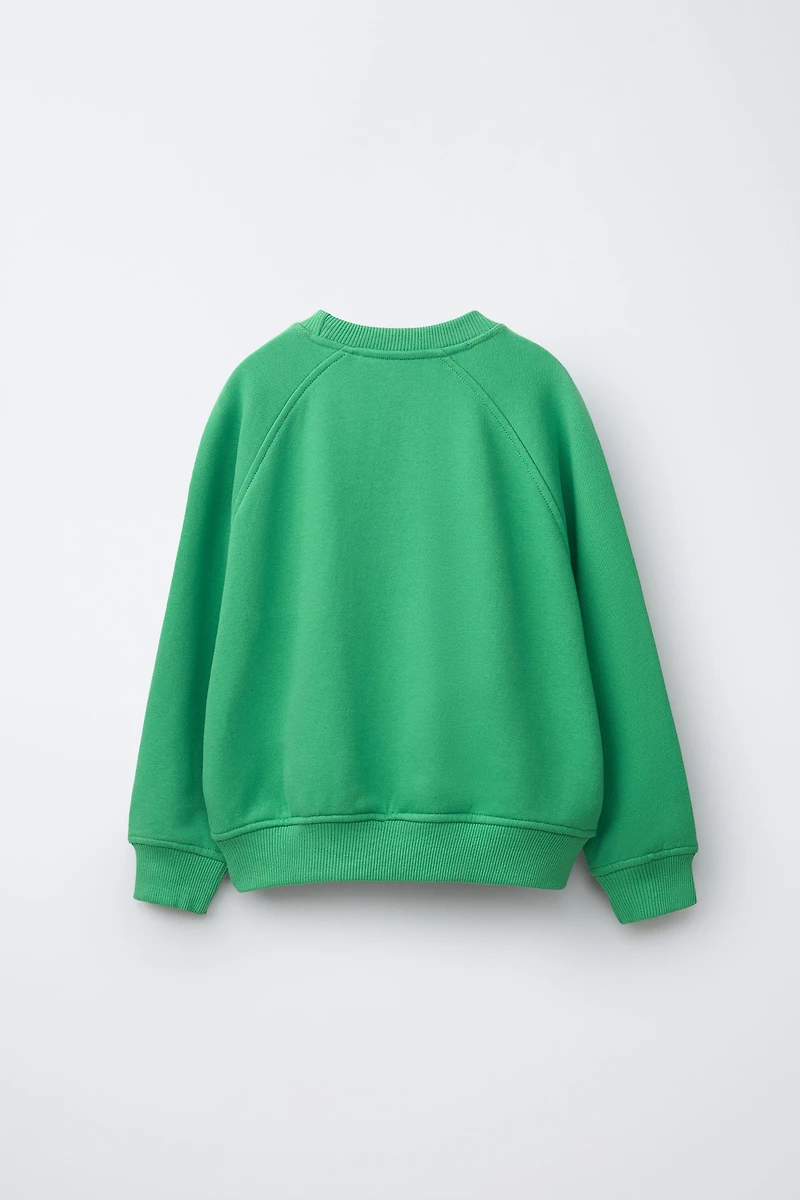 SWEAT MANCHES RAGLAN