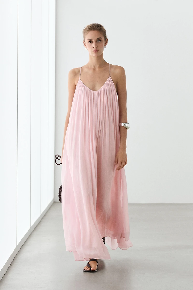Flowing pleated spaghetti strap dress