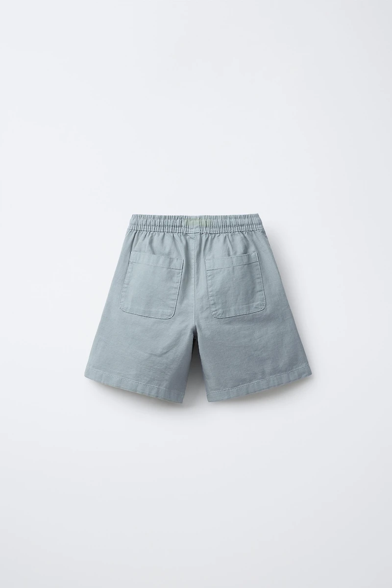 BERMUDA EN COTON COUPE AMPLE ÉTIQUETTE