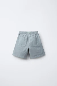 BERMUDA EN COTON COUPE AMPLE ÉTIQUETTE