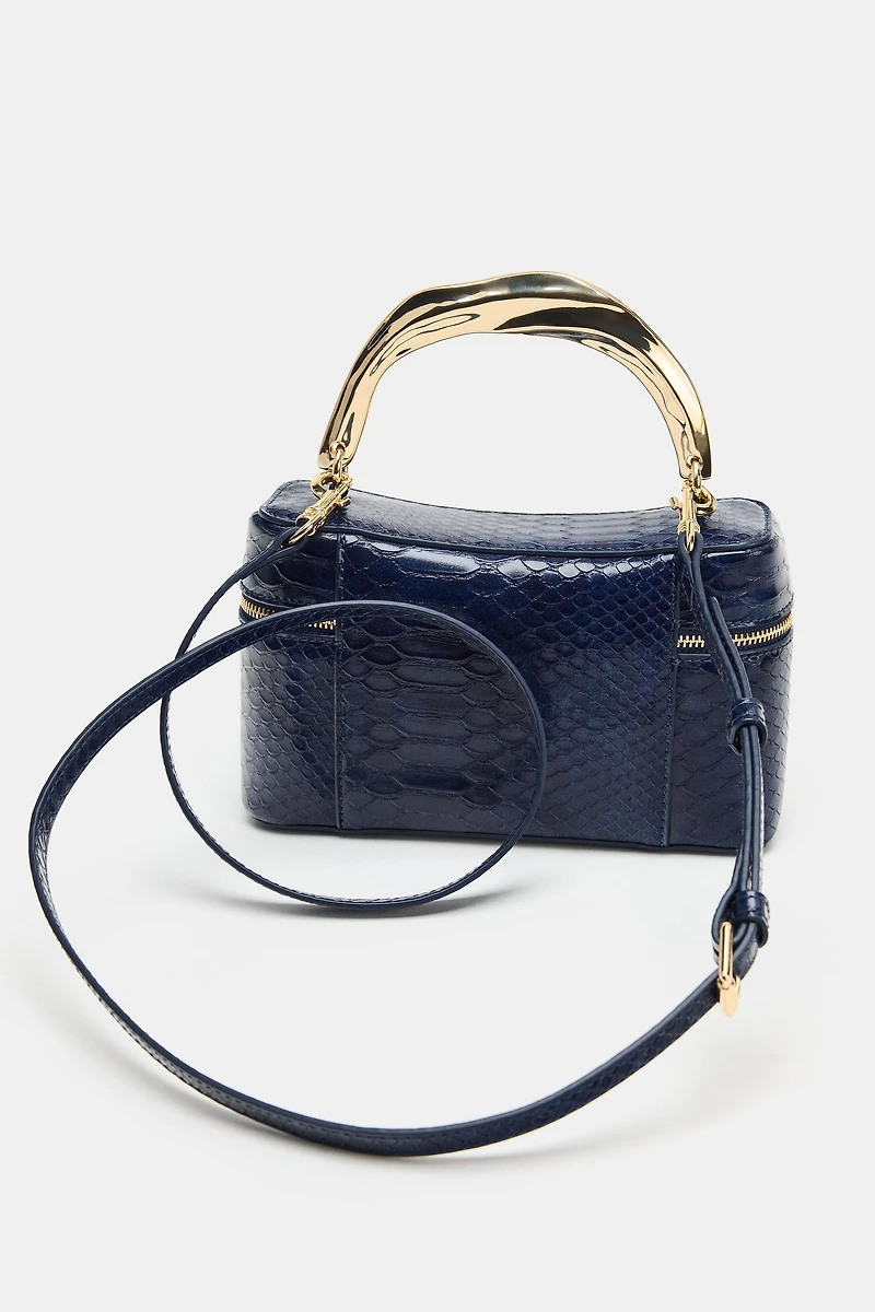 EMBOSSED VANITY BAG