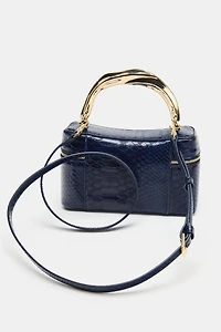 EMBOSSED VANITY BAG
