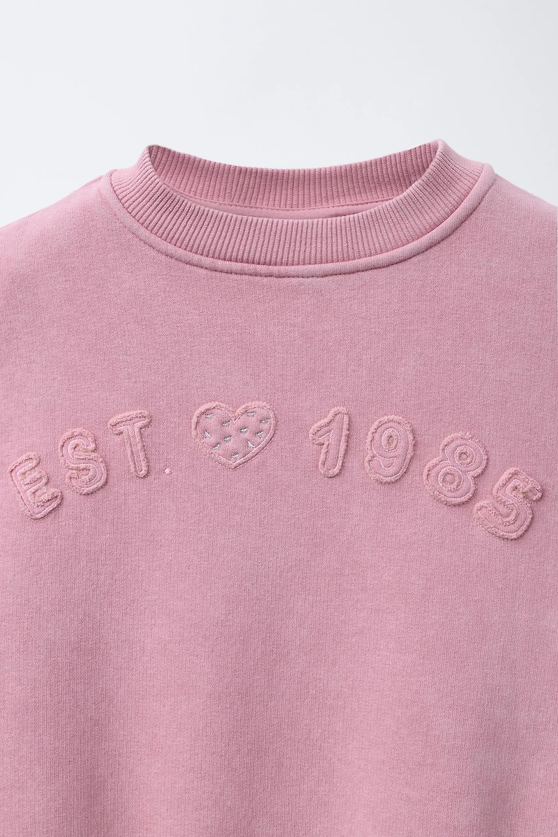 WASHED EFFECT PATCHES SWEATSHIRT