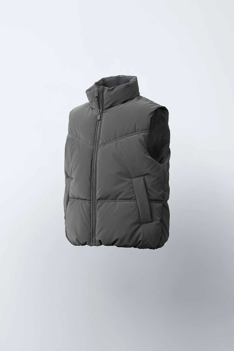 RUBBERIZED VEST