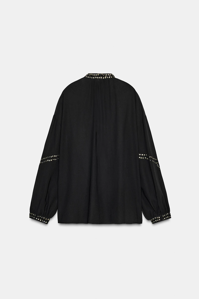 BLOUSE SEMI-TRANSPARENTE À FANTAISIE