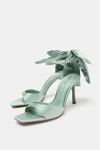 MAXI BOW HEELED SANDALS