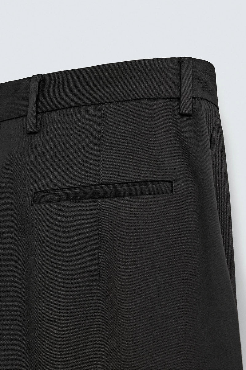PLEATED WIDE FIT PANTS