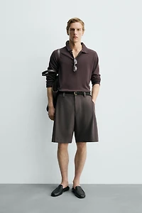 RELAXED FIT SIDE PLEAT SHORTS