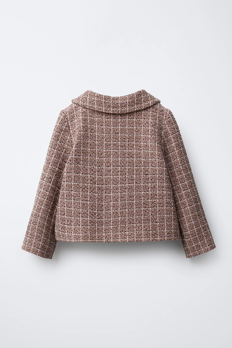 VESTE STRUCTURÉE À CARREAUX ET NŒUDS EN VELOURS