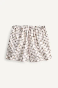 PLAID AND FLORAL LIMITED EDITION SWIM SHORTS