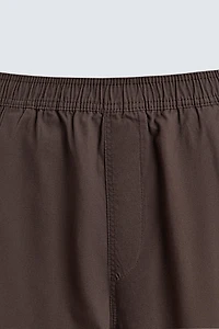 PANTALON BALLON À PLIS