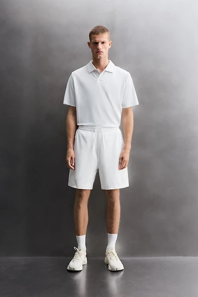 SHORT DE SPORT MÉLANGE COTON 9 POUCES